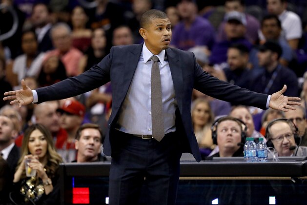 Phoenix Suns coach Earl Watson reacts to a call during the first half of the team's NBA basketball game against the Portland Trail Blazers, Wednesday, Oct. 18, 2017, in Phoenix. (AP Photo/Matt York)