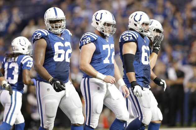 Members of the Indianapolis Colts offensive line, left to right, Le'Raven Clark, Mike Personand Indianapolis Colts offensive guard Jeremy Vujnovich (67) come to the line of scrimmage against the Jacksonville Jaguars during the second half of an NFL football game in Indianapolis, Sunday, Oct. 22, 2017. (AP Photo/AJ Mast)