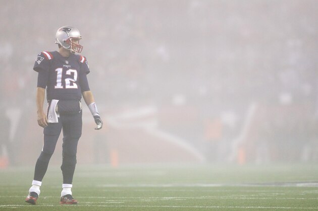 FOXBORO, MASSACHUSETTS - OCTOBER 22:  Tom Brady #12 of the New England Patriots reacts as fog falls on the field during the fourth quarter of a game against the Atlanta Falcons at Gillette Stadium on October 22, 2017 in Foxboro, Massachusetts.  (Photo by Maddie Meyer/Getty Images)