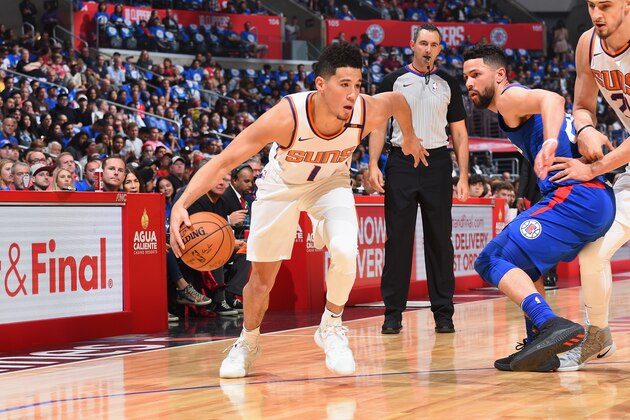 LOS ANGELES, CA - OCTOBER 21:  Devin Booker #1 of the Phoenix Suns handles the ball against the LA Clippers on OCTOBER 21, 2017 at STAPLES Center in Los Angeles, California. NOTE TO USER: User expressly acknowledges and agrees that, by downloading and/or using this Photograph, user is consenting to the terms and conditions of the Getty Images License Agreement. Mandatory Copyright Notice: Copyright 2017 NBAE (Photo by Andrew D. Bernstein/NBAE via Getty Images)