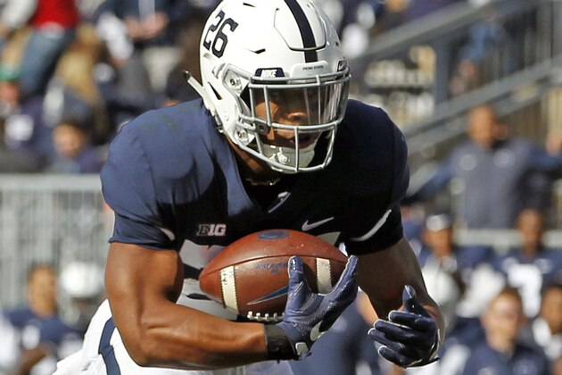 Penn State's Saquon Barkley (26) finds a hole in the Indiana defense during the first half of an NCAA college football game in State College, Pa., Saturday, Sept. 30, 2017. (AP Photo/Chris Knight)