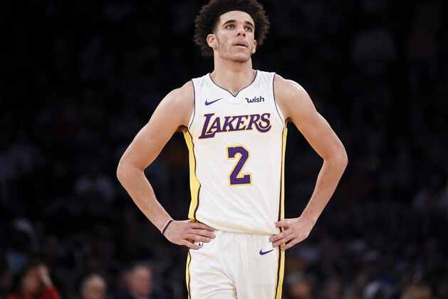 Los Angeles Lakers guard Lonzo Ball looks up during a break in play during the first half of an NBA basketball game against the New Orleans Pelicans in Los Angeles, Sunday, Oct. 22, 2017. (AP Photo/Kelvin Kuo)