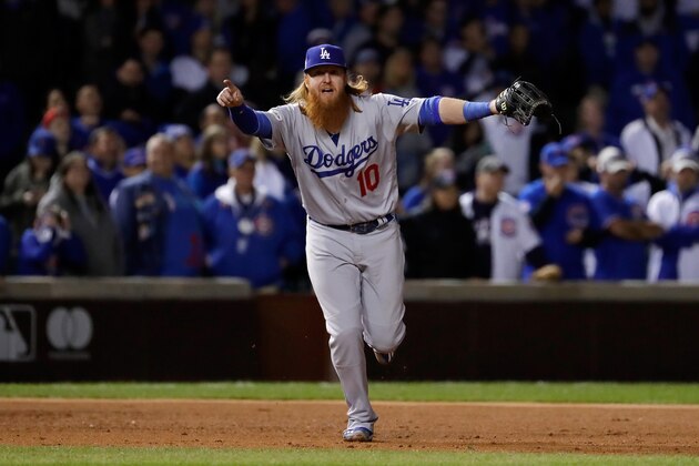CHICAGO, IL - OCTOBER 19:  Justin Turner #10 of the Los Angeles Dodgers celebrates after beating the Chicago Cubs 11-1 in game five of the National League Championship Series at Wrigley Field on October 19, 2017 in Chicago, Illinois. The Dodgers advance to the 2017 World Series. (Photo by Jamie Squire/Getty Images)