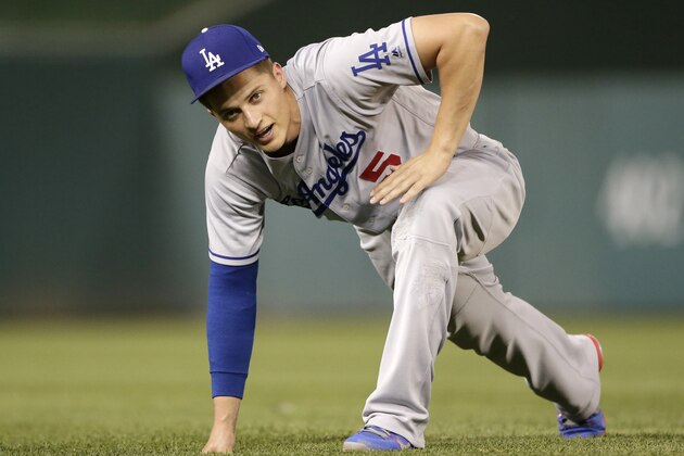 Los Angeles Dodgers' Corey Seager stretches prior to a baseball game between the Los Angeles Dodgers and Washington Nationals, Sunday, Sept. 17, 2017, in Washington. (AP Photo/Mark Tenally)