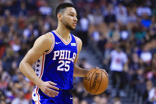 TORONTO, ON - OCTOBER 21:  Ben Simmons #25 of the Philadelphia 76ers dribbles the ball during the first half of an NBA game against the Toronto Raptors at Air Canada Centre on October 21, 2017 in Toronto, Canada.  NOTE TO USER: User expressly acknowledges and agrees that, by downloading and or using this photograph, User is consenting to the terms and conditions of the Getty Images License Agreement.  (Photo by Vaughn Ridley/Getty Images)