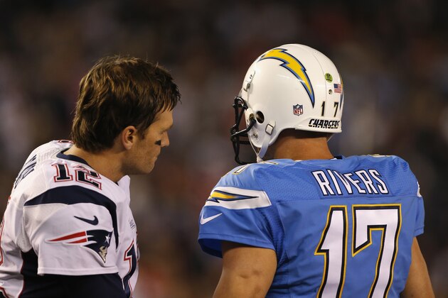 SAN DIEGO, CA - DECEMBER 07:  Quarterback Tom Brady #12 of the New England Patriots and quarterback Philip Rivers #17 of the San Diego Chargers talks before their game at Qualcomm Stadium on December 7, 2014 in San Diego, California.  (Photo by Todd Warshaw/Getty Images)