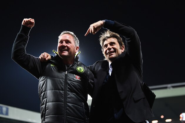 WEST BROMWICH, ENGLAND - MAY 12: Antonio Conte, Manager of Chelsea and Steve Holland, Chelsea first team coach celebrate winning the league after the Premier League match between West Bromwich Albion and Chelsea at The Hawthorns on May 12, 2017 in West Bromwich, England. Chelsea are crowned champions after a 1-0 victory against West Bromwich Albion. (Photo by Michael Regan/Getty Images)