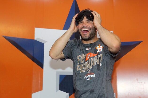 HOUSTON, TX - OCTOBER 21:  Jose Altuve #27 of the Houston Astros celebrates in the locker room after defeating the New York Yankees by a score of 4-0 to win Game Seven of the American League Championship Series at Minute Maid Park on October 21, 2017 in Houston, Texas. The Houston Astros advance to face the Los Angeles Dodgers in the World Series.  (Photo by Elsa/Getty Images)