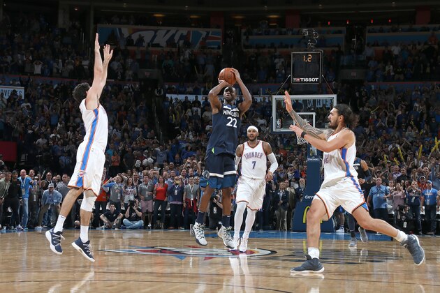 OKLAHOMA CITY, OK - OCTOBER 22:  Andrew Wiggins #22 of the Minnesota Timberwolves shoots the winning shot during the game against the Oklahoma City Thunder on October 22, 2017 at Chesapeake Energy Arena in Oklahoma City, Oklahoma. NOTE TO USER: User expressly acknowledges and agrees that, by downloading and or using this photograph, User is consenting to the terms and conditions of the Getty Images License Agreement. Mandatory Copyright Notice: Copyright 2017 NBAE (Photo by Layne Murdoch/NBAE via Getty Images)