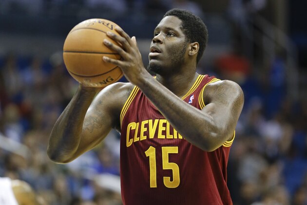 Cleveland Cavaliers' Anthony Bennett (15) makes a free throw shot against the Orlando Magic during the first half of an NBA preseason basketball game in Orlando, Fla., Friday, Oct. 11, 2013.(AP Photo/John Raoux)