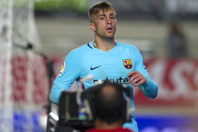 Barcelona's Gerard Deulofeu looks to a TV camera after scoring his side's second goal against Murcia during the Copa del Rey round of 16 first leg soccer match between Murcia and Barcelona at the Nueva Condomina stadium in Murcia, Tuesday, Oct. 24, 2017. Deulofeu scored once in Barcelona 3-0 victory. (AP Photo/Ferran Viros)