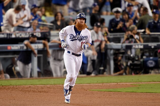 LOS ANGELES, CA - OCTOBER 24:  Justin Turner #10 of the Los Angeles Dodgers runs the bases after hitting a two-run home run during the sixth inning against the Houston Astros in game one of the 2017 World Series at Dodger Stadium on October 24, 2017 in Los Angeles, California.  (Photo by Kevork Djansezian/Getty Images)