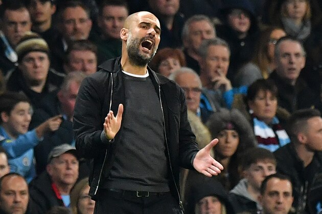 Manchester City's Spanish manager Pep Guardiola gestures on the touchline during the English League Cup fourth round football match between Manchester City and Wolverhampton Wanderers at the Etihad Stadium in Manchester, north west England, on October 24, 2017. / AFP PHOTO / Anthony DEVLIN / RESTRICTED TO EDITORIAL USE. No use with unauthorized audio, video, data, fixture lists, club/league logos or 'live' services. Online in-match use limited to 75 images, no video emulation. No use in betting, games or single club/league/player publications.  /         (Photo credit should read ANTHONY DEVLIN/AFP/Getty Images)
