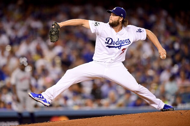 LOS ANGELES, CA - OCTOBER 24:  Clayton Kershaw #22 of the Los Angeles Dodgers pitches during the seventh inning against the Houston Astros in game one of the 2017 World Series at Dodger Stadium on October 24, 2017 in Los Angeles, California.  (Photo by Harry How/Getty Images)