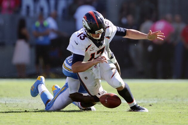 CARSON, CA - OCTOBER 22:  Chris McCain #40 of the Los Angeles Chargers sacks Trevor Siemian #13 of the Denver Broncos in the second quarter during the game against the Los Angeles Chargers at the StubHub Center on October 22, 2017 in Carson, California.  (Photo by Jeff Gross/Getty Images)