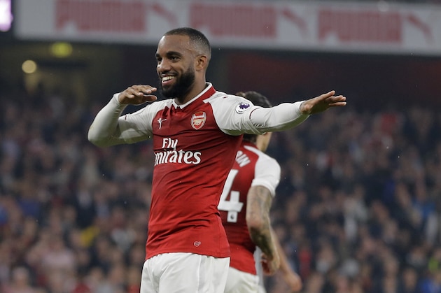 Arsenal's Alexandre Lacazette celebrates after scoring his sides second goal from the penalty sport during their English Premier League soccer match between Arsenal and West Bromwich Albion at the Emirates stadium in London Monday, Sept. 25, 2017. (AP Photo/Alastair Grant)