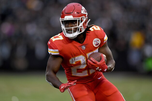 OAKLAND, CA - OCTOBER 19:  Kareem Hunt #27 of the Kansas City Chiefs carries the ball against the Oakland Raiders during their NFL football game at Oakland-Alameda County Coliseum on October 19, 2017 in Oakland, California.  (Photo by Thearon W. Henderson/Getty Images)
