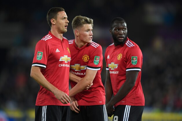 SWANSEA, WALES - OCTOBER 24: Nemanja Matic (l) Scott McTominay and Romelu Lukaku of United in the defensive wall during the Carabao Cup Fourth Round match between Swansea City and Manchester United at Liberty Stadium on October 24, 2017 in Swansea, Wales.  (Photo by Stu Forster/Getty Images)