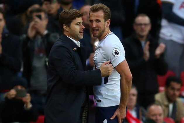 LONDON, ENGLAND - OCTOBER 22: Harry Kane of Tottenham Hotspur is greeted by Mauricio Pochettino manager / head coach of Tottenham Hotspur as he comes off as substitute during the Premier League match between Tottenham Hotspur and Liverpool at Wembley Stadium on October 22, 2017 in London, England. (Photo by Catherine Ivill - AMA/Getty Images)
