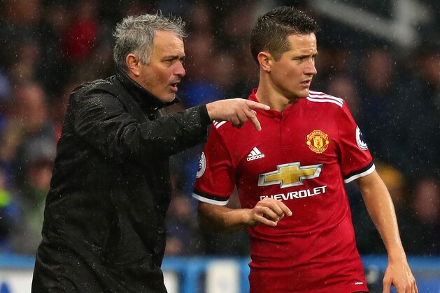 HUDDERSFIELD, ENGLAND - OCTOBER 21: Jose Mourinho, Manager of Manchester United talks with Ander Herrera of Manchester United on the touchline during the Premier League match between Huddersfield Town and Manchester United at John Smith's Stadium on October 21, 2017 in Huddersfield, England.  (Photo by Chris Brunskill Ltd/Getty Images)