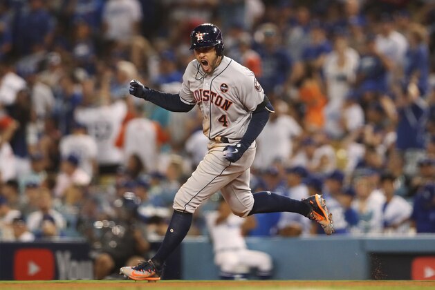 LOS ANGELES, CA - OCTOBER 25:  George Springer #4 of the Houston Astros runs the bases after hitting a two-run home run during the eleventh inning against the Los Angeles Dodgers in game two of the 2017 World Series at Dodger Stadium on October 25, 2017 in Los Angeles, California.  (Photo by Christian Petersen/Getty Images)