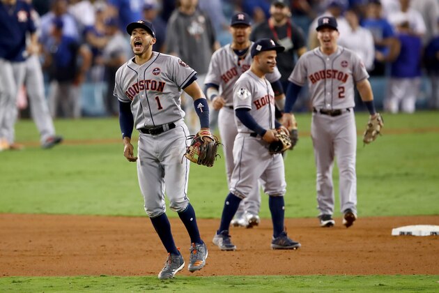 LOS ANGELES, CA - OCTOBER 25:  Carlos Correa #1 of the Houston Astros celebrates defeating the Los Angeles Dodgers 7-6 in eleven innings to win game two of the 2017 World Series at Dodger Stadium on October 25, 2017 in Los Angeles, California.  (Photo by Ezra Shaw/Getty Images)