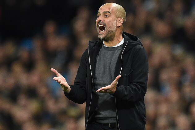 Manchester City's Spanish manager Pep Guardiola shouts instructions to his players from the touchline during the UEFA Champions League Group F football match between Manchester City and Napoli at the Etihad Stadium in Manchester, north west England, on October 17, 2017. / AFP PHOTO / Oli SCARFF        (Photo credit should read OLI SCARFF/AFP/Getty Images)