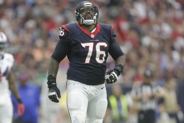 Houston Texans tackle Duane Brown (76) gets up after an injury during the first quarter of an NFL football game, Sunday, Sept. 28, 2014, in Houston. (AP Photo/Patric Schneider)