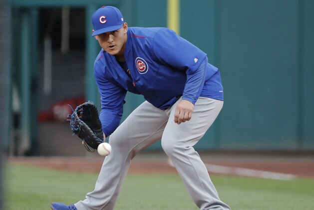 Chicago Cubs first baseman Anthony Rizzo fields grounders during practice before the start of Game 1 of baseball's National League Division Series against the Washington Nationals at Nationals Park, Friday, Oct. 6, 2017, in Washington. (AP Photo/Pablo Martinez Monsivais)