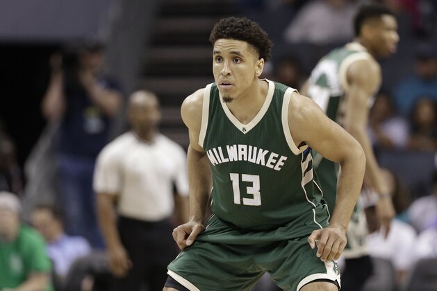 Milwaukee Bucks' Malcolm Brogdon (13) waits to guard a Charlotte Hornets player in the second half of an NBA basketball game in Charlotte, N.C., Tuesday, March 28, 2017. The Bucks won 118-108. (AP Photo/Chuck Burton)
