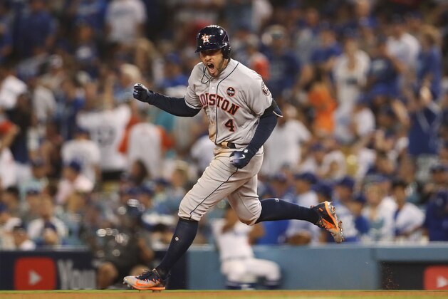 LOS ANGELES, CA - OCTOBER 25:  George Springer #4 of the Houston Astros runs the bases after hitting a two-run home run during the eleventh inning against the Los Angeles Dodgers in game two of the 2017 World Series at Dodger Stadium on October 25, 2017 in Los Angeles, California.  (Photo by Christian Petersen/Getty Images)