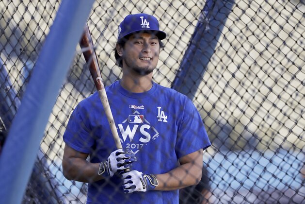 Los Angeles Dodgers starting pitcher Yu Darvish, of Japan, watches during batting practice for baseball's World Series against the Houston Astros, Monday, Oct. 23, 2017, in Los Angeles. (AP Photo/David J. Phillip)