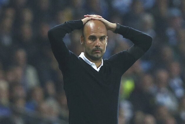 Manchester City manager Pep Guardiola during the English Premier League soccer match between Manchester City and Everton at the Etihad Stadium in Manchester, England, Monday, Aug. 21, 2017. (AP Photo/Dave Thompson)