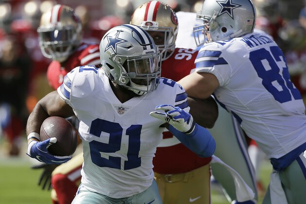 Dallas Cowboys running back Ezekiel Elliott (21) runs against the San Francisco 49ers during the first half of an NFL football game in Santa Clara, Calif., Sunday, Oct. 22, 2017. (AP Photo/Eric Risberg)