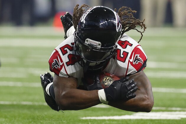 Atlanta Falcons running back Devonta Freeman dives for yardage against the Detroit Lions during an NFL football game in Detroit, Sunday, Sept. 24, 2017. Atlanta won 30-26. (AP Photo/Paul Sancya)