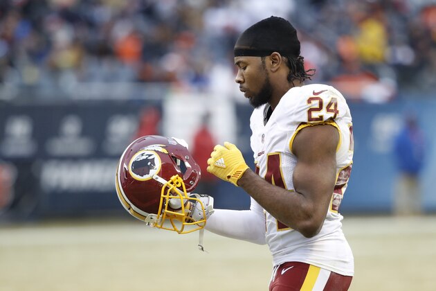 CHICAGO, IL - DECEMBER 24: Josh Norman #24 of the Washington Redskins gets set to put his helmet on as he takes the field during the game against the Chicago Bears at Soldier Field on December 24, 2016 in Chicago, Illinois. Washington defeated Chicago 41-21. (Photo by Joe Robbins/Getty Images)