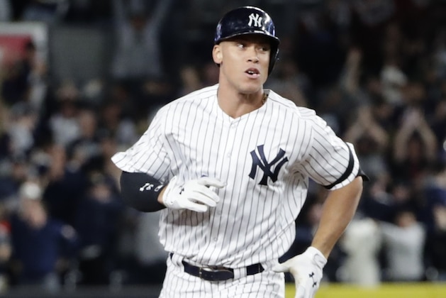 New York Yankees' Aaron Judge runs the bases after hitting a two-run home run during the fourth inning of the American League wild-card baseball game against the Minnesota Twins Tuesday, Oct. 3, 2017, in New York. (AP Photo/Frank Franklin II)