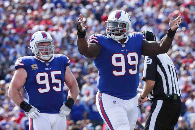 ORCHARD PARK, NY - SEPTEMBER 10:  Marcell Dareus #99 of the Buffalo Bills celebrates as teammate Kyle Williams #95 looks on during the second half against the New York Jets on September 10, 2017 at New Era Field in Orchard Park, New York.  (Photo by Tom Szczerbowski/Getty Images)