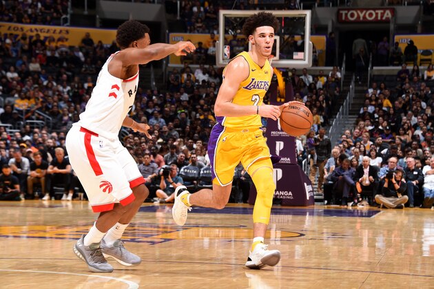 LOS ANGELES, CA - OCTOBER 27: Lonzo Ball #2 of the Los Angeles Lakers handle the ball against Kyle Lowry #7 of the Toronto Raptors during the game between the two teams on October 27, 2017 at STAPLES Center in Los Angeles, California. NOTE TO USER: User expressly acknowledges and agrees that, by downloading and/or using this Photograph, user is consenting to the terms and conditions of the Getty Images License Agreement. Mandatory Copyright Notice: Copyright 2017 NBAE (Photo by Andrew D. Bernstein/NBAE via Getty Images)