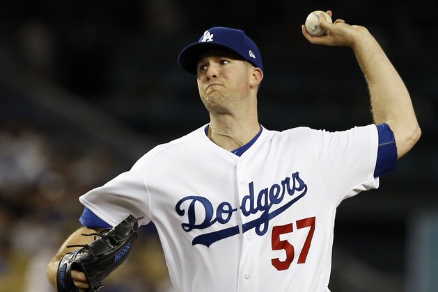 Los Angeles Dodgers starting pitcher Alex Wood delivers during the first inning of a baseball game against the San Diego Padres in Los Angeles, Tuesday, Sept. 26, 2017. (AP Photo/Alex Gallardo)