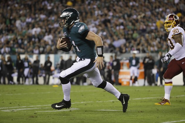 Philadelphia Eagles quarterback Carson Wentz (11) in action during an NFL football game against the Washington Redskins, Monday, Oct. 23, 2017, in Philadelphia. (AP Photo/Matt Rourke) Philadelphia Eagles quarterback Carson Wentz (11) in action during an NFL football game against the Washington Redskins, Monday, Oct. 23, 2017, in Philadelphia. (AP Photo/Matt Rourke)