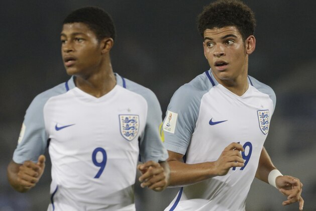 England's Morgan Gibbs White, right, and Rhian Brewster follow the ball during the FIFA U-17 World Cup semifinal match against Brazil in Kolkata, India, Wednesday, Oct. 25, 2017. (AP Photo/Bikas Das)