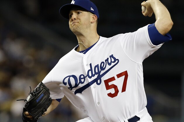 Los Angeles Dodgers starting pitcher Alex Wood delivers during the first inning of a baseball game against the San Diego Padres in Los Angeles, Tuesday, Sept. 26, 2017. (AP Photo/Alex Gallardo)