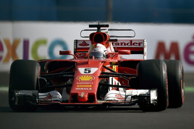 Ferrari's German driver Sebastian Vettel powers his car during the third practice session of the F1 Mexico Grand Prix at the Hermanos Rodriguez circuit in Mexico City on October 28, 2017. / AFP PHOTO / ALFREDO ESTRELLA        (Photo credit should read ALFREDO ESTRELLA/AFP/Getty Images)