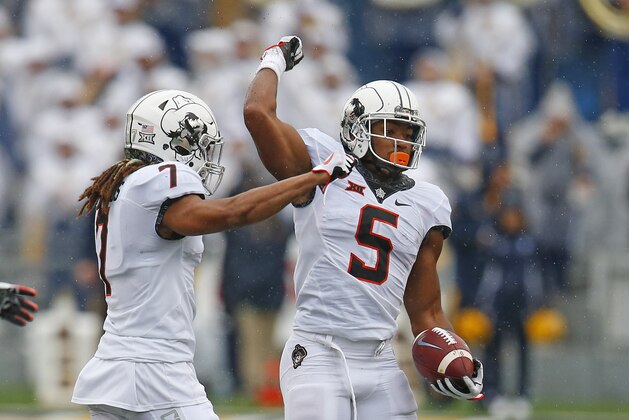 MORGANTOWN, WV - OCTOBER 28:  Jerel Morrow #5 of the Oklahoma State Cowboys celebrates in the second half against the West Virginia Mountaineers at Mountaineer Field on October 28, 2017 in Morgantown, West Virginia.  (Photo by Justin K. Aller/Getty Images)