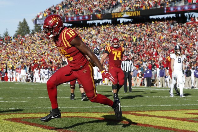 Iowa State wide receiver Hakeem Butler (18) celebrates after catching a 4-yard touchdown pass during the first half of an NCAA college football game against TCU, Saturday, Oct. 28, 2017, in Ames, Iowa. (AP Photo/Charlie Neibergall)
