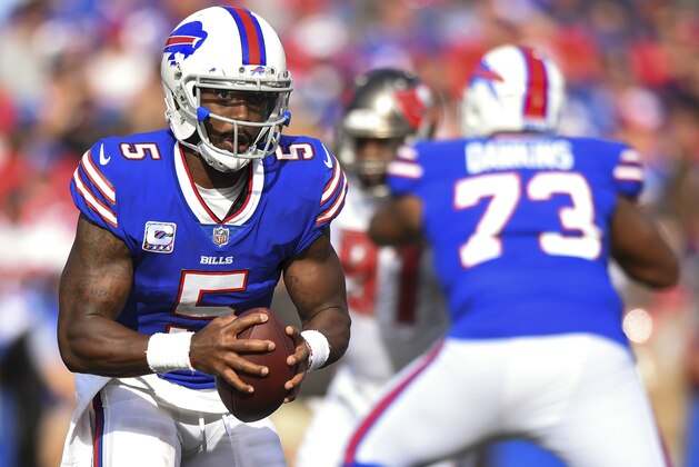Buffalo Bills quarterback Tyrod Taylor (5) runs with the ball against the Tampa Bay Buccaneers during the first half of an NFL football game Sunday, Oct. 22, 2017, in Orchard Park, N.Y. (AP Photo/Rich Barnes)