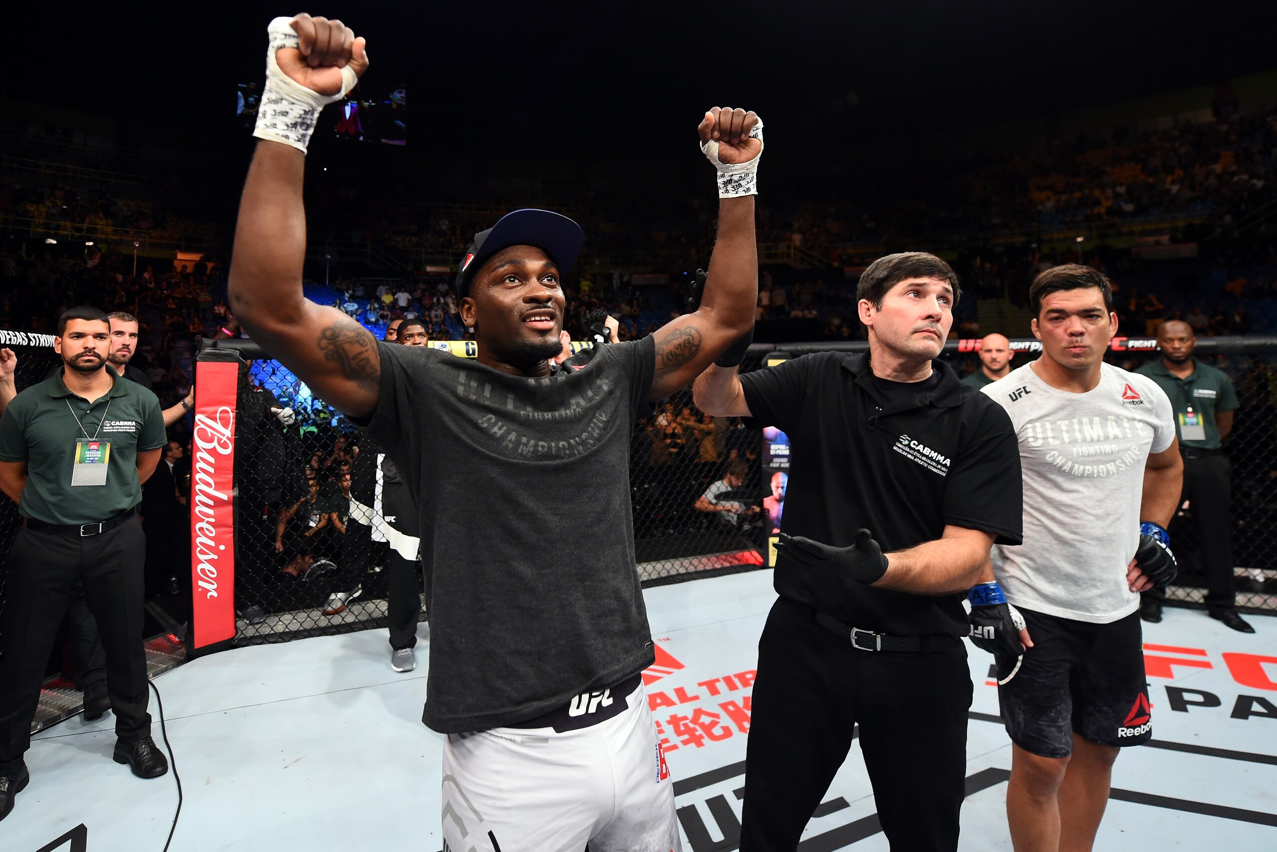 SAO PAULO, BRAZIL - OCTOBER 28:  (L-R) Derek Brunson celebrates after defeating Lyoto Machida of Brazil in their middleweight bout during the UFC Fight Night event inside the Ibirapuera Gymnasium on October 28, 2017 in Sao Paulo, Brazil. (Photo by Josh Hedges/Zuffa LLC/Zuffa LLC via Getty Images)