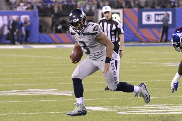 Seattle Seahawks quarterback Russell Wilson (3) scrambles during the second half of an NFL football game against the New York Giants, Sunday, Oct. 22, 2017, in East Rutherford, N.J. (AP Photo/Bill Kostroun)