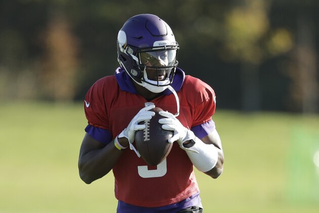 Minnesota Vikings quarterback Teddy Bridgewater takes part in an NFL training session at the London Irish rugby team training ground in the Sunbury-onThames suburb of south west London, Friday, Oct. 27, 2017. The Minnesota Vikings are preparing for an NFL regular season game against the Cleveland Browns in London on Sunday. (AP Photo/Matt Dunham)